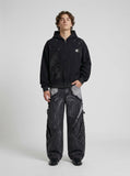 DAXUEN Oversized full-zip hoodie with starry splatter design — model photo