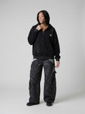 DAXUEN Oversized full-zip hoodie with starry splatter design — model photo