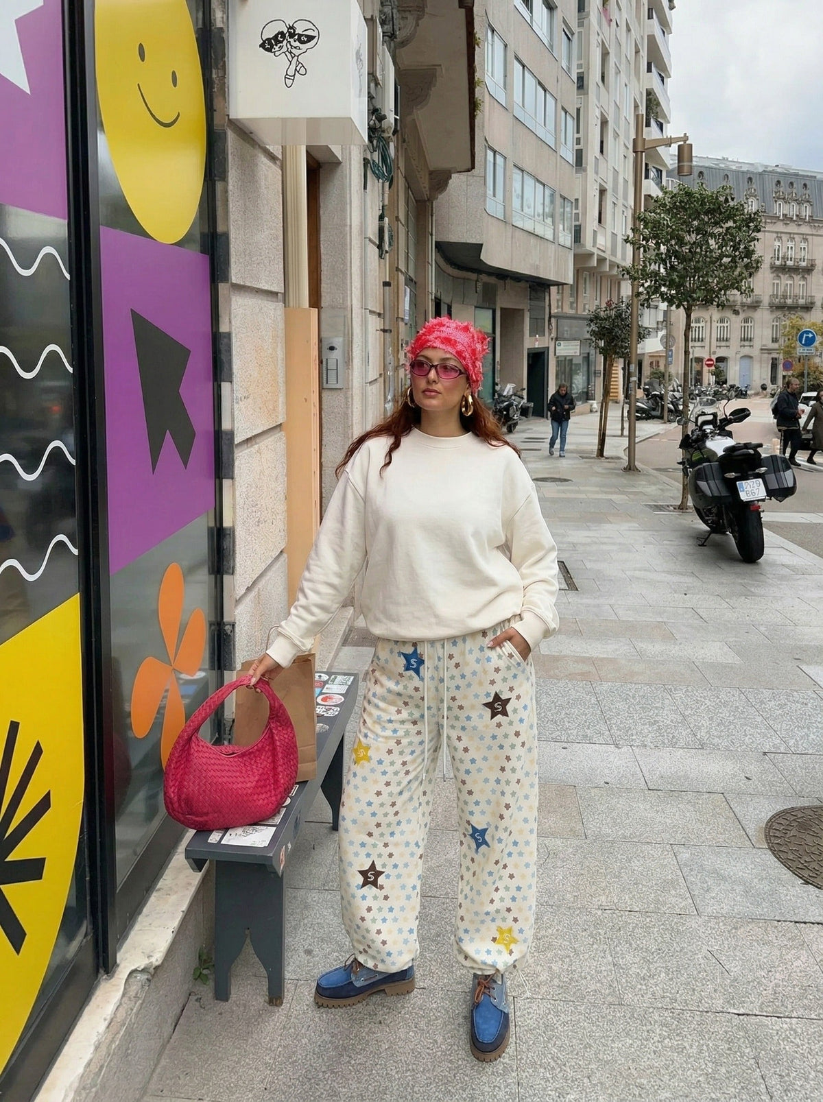 DAXUEN Cream wide-leg pants with star print and embroidery — model photo