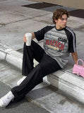DAXUEN Men's oversized short-sleeved striped t-shirt — model photo
