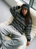 DAXUEN black oversized striped long-sleeve tee — model photo