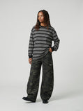 DAXUEN black oversized striped long-sleeve tee — model photo