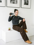DAXUEN olive green cargo pants with large pockets — model photo