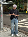 DAXUEN Studded abstract logo short-sleeved t-shirt — model photo