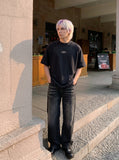 DAXUEN Studded abstract logo short-sleeved t-shirt — model photo