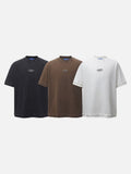 DAXUEN Oversized t-shirt with studded details and abstract logo
