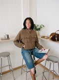 DAXUEN blue wide-leg denim shorts with studded waistband — model photo