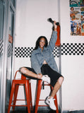 DAXUEN blue wide-leg denim shorts with studded waistband — model photo