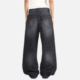 DAXUEN Distressed wide-leg jeans with pyramid studs