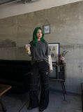 DAXUEN Black wide-leg pants with decorative zippers and studs — model photo