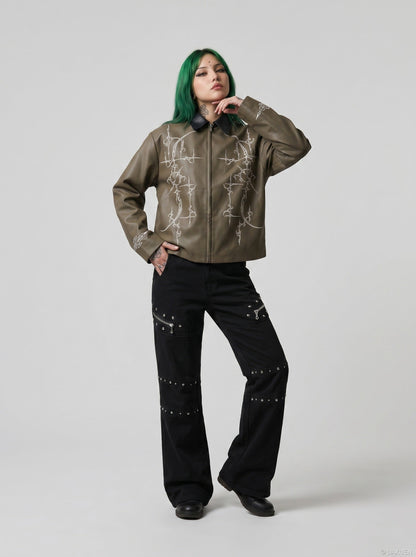 DAXUEN Black wide-leg pants with decorative zippers and studs — model photo