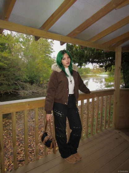 DAXUEN Black wide-leg pants with decorative zippers and studs — model photo