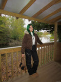 DAXUEN Black wide-leg pants with decorative zippers and studs — model photo