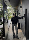 DAXUEN black workwear jacket with studded pockets — model photo