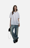 DAXUEN black oversized stylized chest graphic T-shirt
