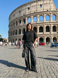 DAXUEN black oversized stylized chest graphic T-shirt — model photo