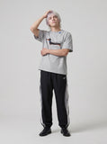 DAXUEN grey marl stylized dachshund graphic t-shirt — model photo