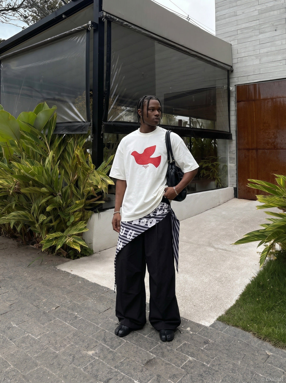 DAXUEN white oversized stylized dove graphic t-shirt — model photo