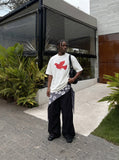 DAXUEN white oversized stylized dove graphic t-shirt — model photo