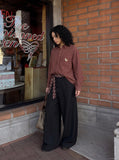 DAXUEN checkered button-up shirt with stylized horse embroidery — model photo