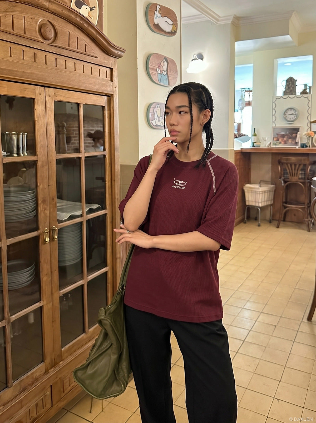 DAXUEN deep maroon stylized oval 'ANSWER ME' graphic tee — model photo
