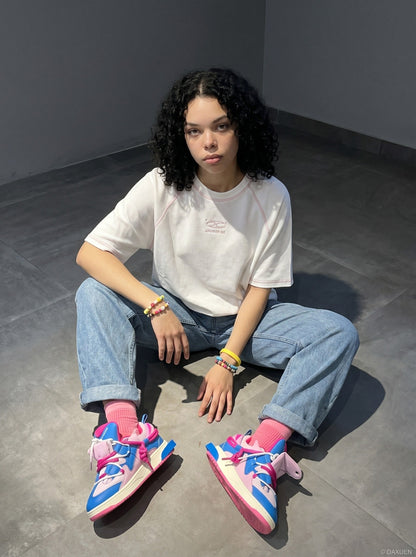 DAXUEN deep maroon stylized oval 'ANSWER ME' graphic tee — model photo