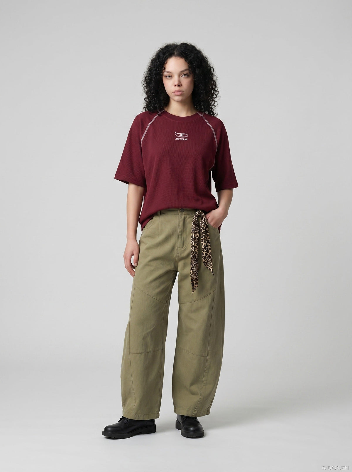 DAXUEN deep maroon stylized oval 'ANSWER ME' graphic tee — model photo