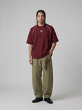 DAXUEN deep maroon stylized oval 'ANSWER ME' graphic tee — model photo