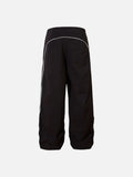 DAXUEN black track pants with stylized oval graphic