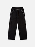 DAXUEN black track pants with stylized oval graphic