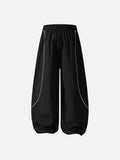 DAXUEN black track pants with stylized oval graphic