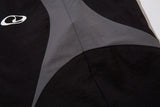 DAXUEN black track pants with stylized oval graphic