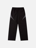 DAXUEN black track pants with stylized oval graphic