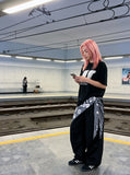 DAXUEN white oversized stylized overlapping S graphic tee — model photo