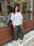 DAXUEN Oversized t-shirt with sun graphic — model photo