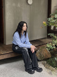 DAXUEN dark wash wide-leg jeans with white animal graphic — model photo