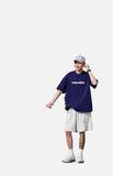 DAXUEN solid color oversized t-shirt with stylized wordmark graphic