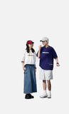 DAXUEN solid color oversized t-shirt with stylized wordmark graphic