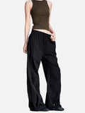 DAXUEN black wide-leg pants with subtle abstract pattern
