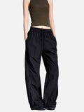 DAXUEN black wide-leg pants with subtle abstract pattern