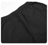 DAXUEN black wide-leg pants with subtle abstract pattern
