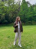 DAXUEN light plaid wide-leg trousers — model photo