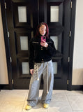 DAXUEN dark brown suede bomber jacket with metallic details — model photo