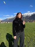DAXUEN dark brown suede bomber jacket with metallic details — model photo