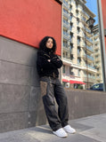 DAXUEN dark brown suede bomber jacket with metallic details — model photo