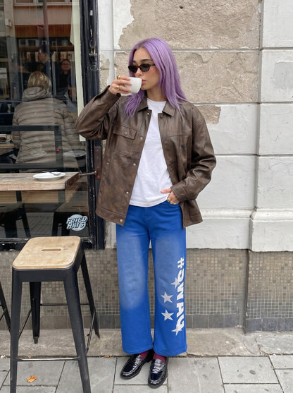 DAXUEN High-waisted wide-leg pants with graphic print — model photo