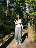 DAXUEN solid black tailored waistband trousers — model photo