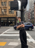 DAXUEN solid black tailored waistband trousers — model photo