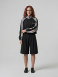 DAXUEN Tailored wide-leg shorts with zipper detail — model photo