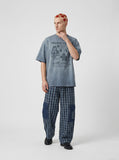 DAXUEN Oversized graphic t-shirt with vintage print — model photo